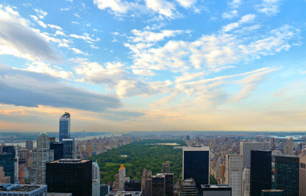 istock 25.05.2016. view of upper east side buildings, roofs, river and central park from rockefeller centre observatory in Manhattan, New York 1002208082