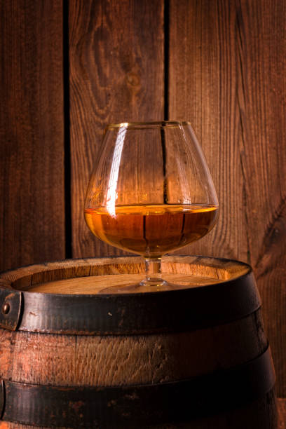 istock delicious bourbon on a wooden barrel 1002212008