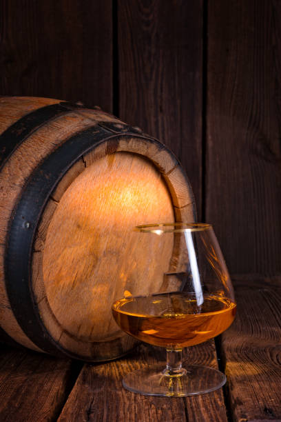 istock delicious bourbon on a wooden barrel 1002212122