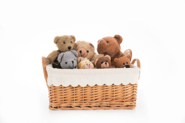 istock Teddy bears in a straw basket 1 1002217250