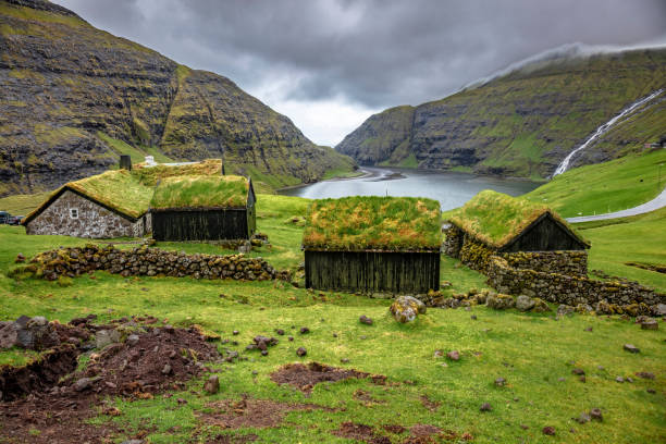 istock House On Field By Mountains Against Sky 1002218560
