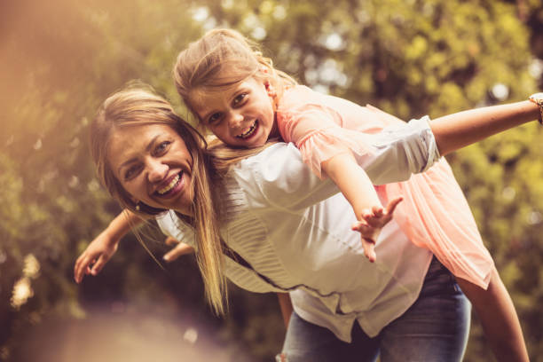 istock Mother and daughter outside. 1002226286