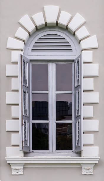 istock Gray vintage wooden windows with white border 1002230728