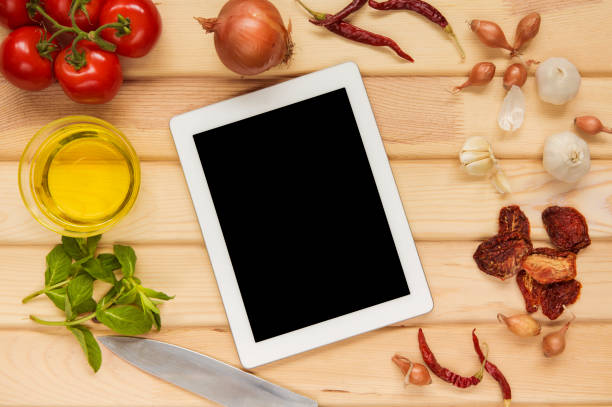 istock Blank digital tablet with fresh ingredients for cooking 1002238504
