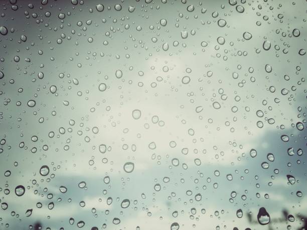 istock Drop water on glass,after the rain,texture background concept 1002243672