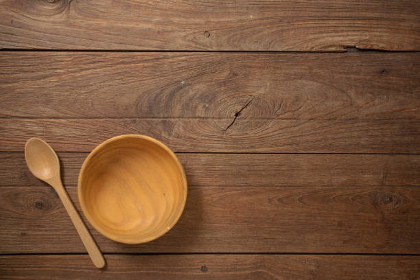 istock Wooden cookware on Dark old wooden table texture background top view 1002248190