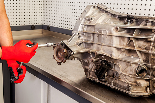 Gearbox in car repair service