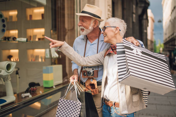 istock Older couple window shopping 1002255984
