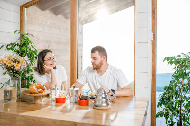 istock Couple having a breakfast at home 1002272422