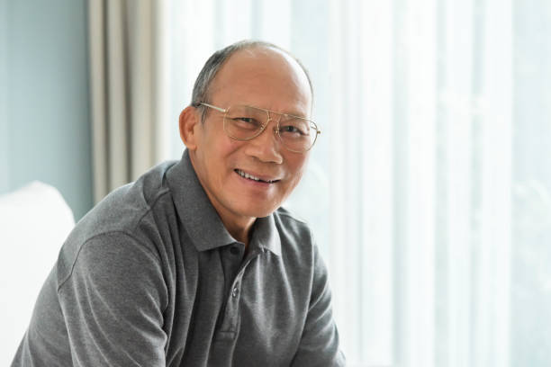 istock Senior man smiling at home. 1002280994
