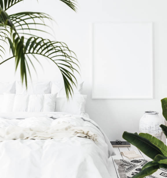 istock Mock-up poster frame in bedroom, Scandinavian style 1002283592