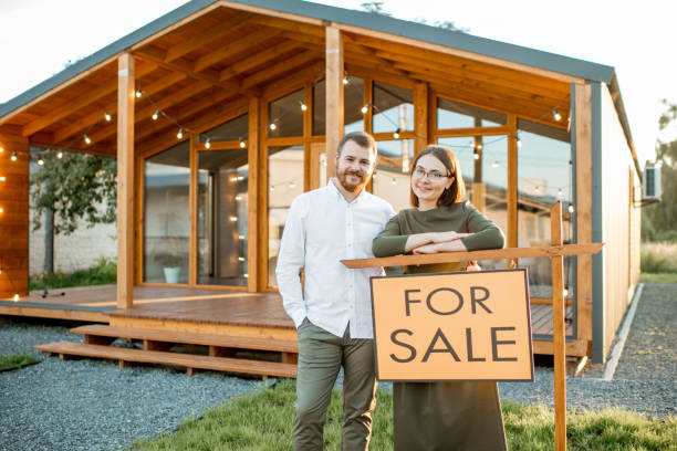 istock Couple selling country house 1002283948