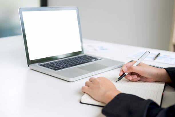 istock Female accountant calculations and analyzing financial graph data with calculator and laptop Business, Financing, Accounting, Doing finance, Economy, Savings Banking Concept 1002284074