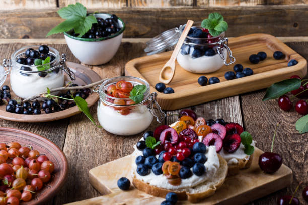 istock Cream cheese sandwiches with fresh summer berries 1002292512