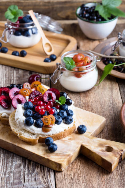 istock Cream cheese sandwiches with fresh summer berries 1002292538
