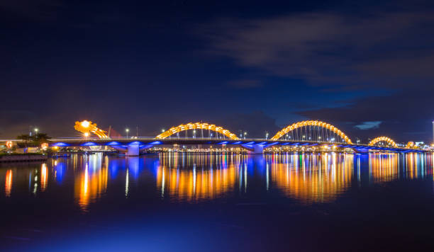 istock Skyline of da nang city by han river (Long exposure image). 1002312346