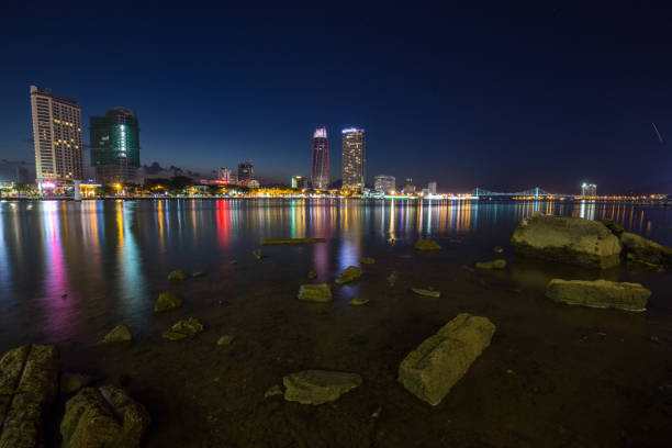 istock Skyline of da nang city by han river (Long exposure image). 1002312496