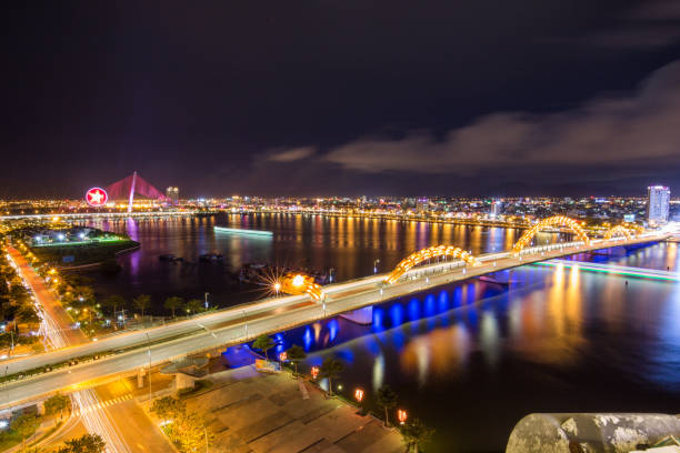 istock Skyline of da nang city by han river (Long exposure image). 1002312568