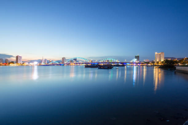 istock Skyline of da nang city by han river (Long exposure image). 1002312580