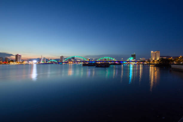 istock Skyline of da nang city by han river (Long exposure image). 1002312624