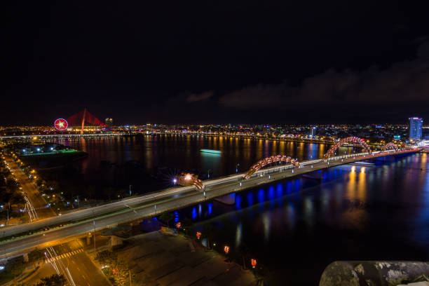 istock Skyline of da nang city by han river (Long exposure image). 1002312714