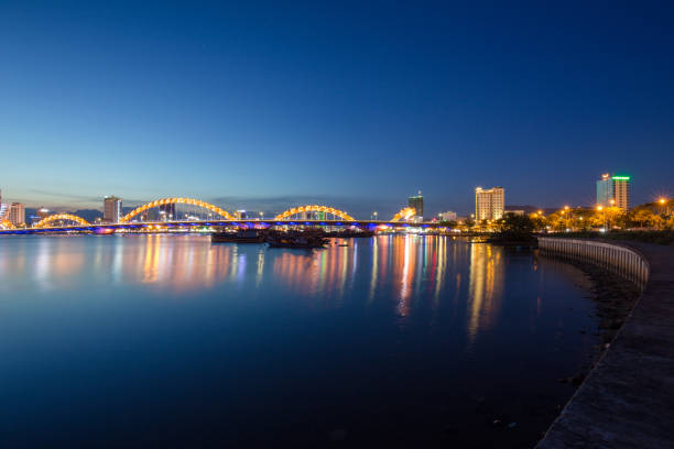istock Skyline of da nang city by han river (Long exposure image). 1002312768