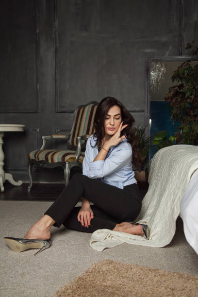 istock beautiful woman at home 1002317940