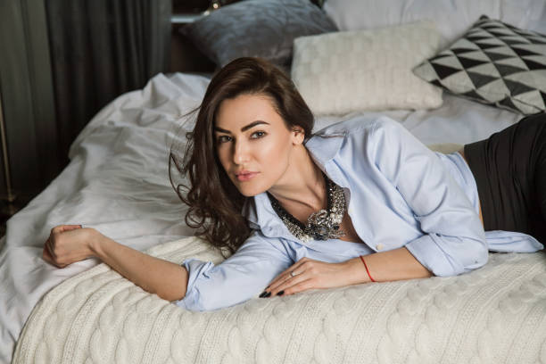 istock beautiful woman at home 1002322694