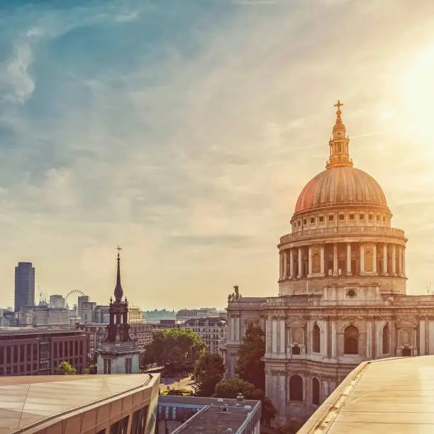 Photo of Dramatic sunset over St Paul's Cathedral and London Eye