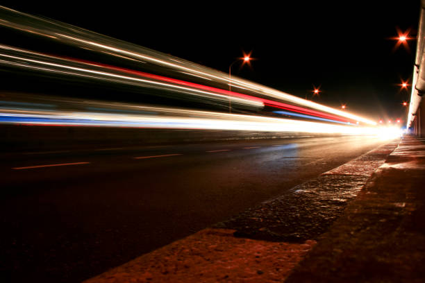 istock Light Trails On Street At Night 1002358110