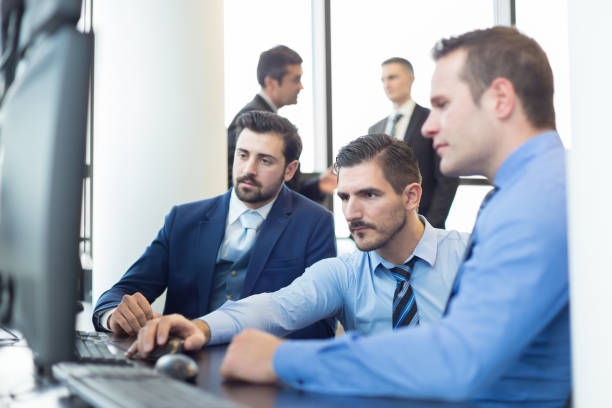 istock Business team working in corporate office. 1002405896