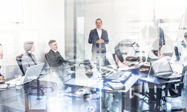 istock Corporate business team office meeting. 1002406026