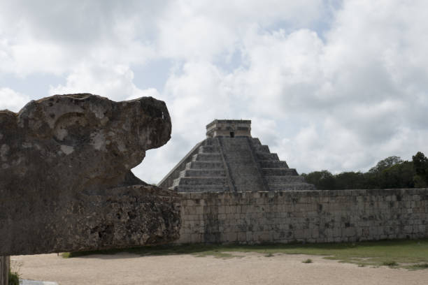 View of Kukulcan pyramid from the Grand Ballcourt View of Kukulcan pyramid from the Grand Ballcourt in Chichen Itza. Chichen Itza was a large pre-Columbian city built by the Maya people, located in Tinúm Municipality, Yucatán State, Mexico. ulama stock pictures, royalty-free photos & images