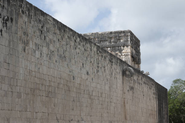Ballgame wall and hoop at Chichen Itza Ballgame court at Chichen Itza. Chichen Itza was a large pre-Columbian city built by the Maya people, located in Tinúm Municipality, Yucatán State, Mexico. ulama stock pictures, royalty-free photos & images