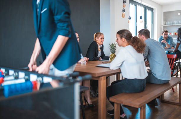 istock Colleagues at cafeteria in office 1002439638