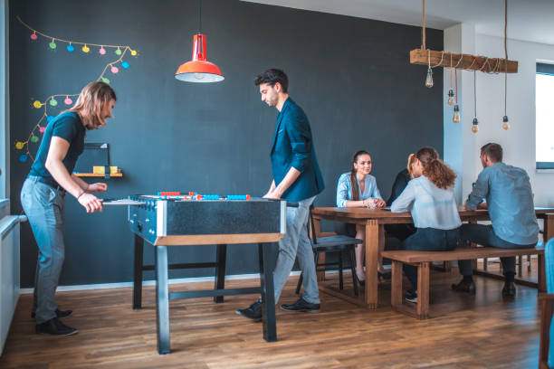 istock Business people spending leisure time in cafeteria 1002439660