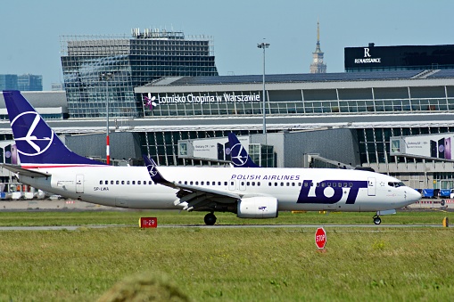 Warsaw, Poland. 28 May 2018. Warsaw Chopin Airport. Turning to apron after landing. Plane line PLL LOT at the airport in Warsaw. SP-LWA LOT - Polish Airlines Boeing 737-89P
