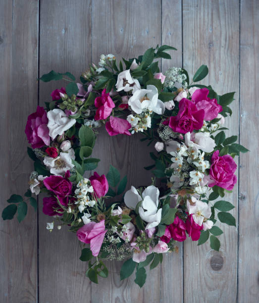 istock Summer wreath made by garden roses 1002447100
