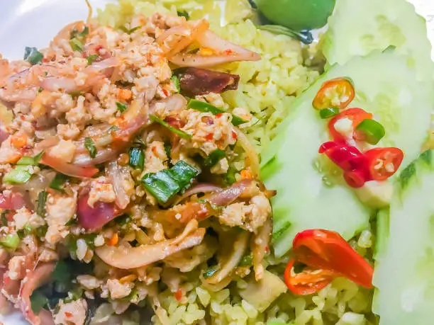 Photo of Larp Moo or Thai spicy minced pork salad, one of the popular street food menus. Don't miss when you visit Thailand.
