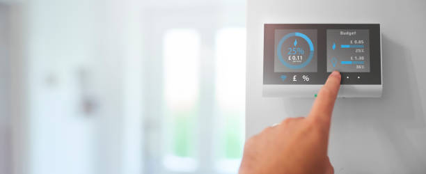 istock Homeowner checking homes energy costs for the day 1002456080