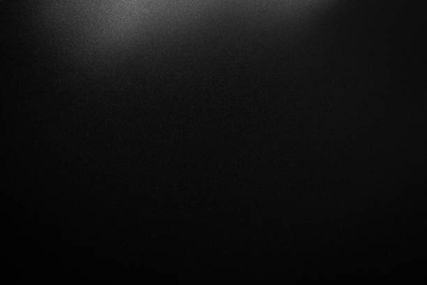istock black paper texture or background with spotlight, dark wall backdrop wallpaper, dark tone. 1002456382