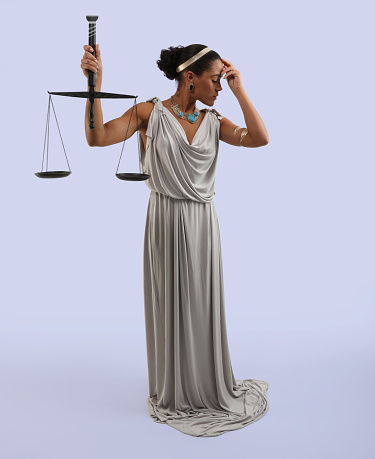 African American Lady Justice with sad expression