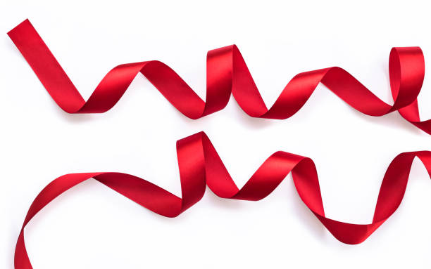 istock Red bow ribbon satin texture isolated on white background with clipping path 1002517900
