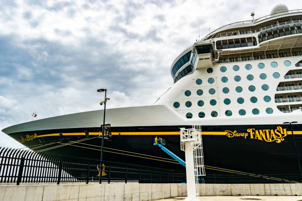 Disney Fantasy Cruise Ship in Falmouth, Jamaica Falmouth, Jamaica - June 03 2015: Disney Fantasy Cruise Ship docked at the Falmouth Cruise Port in Jamaica. falmouth harbor stock pictures, royalty-free photos & images