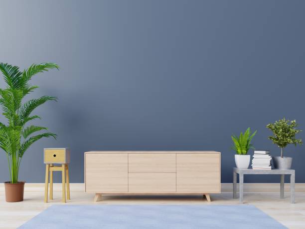 istock Empty room with cabinets and shelves with back dark wall 1002544606