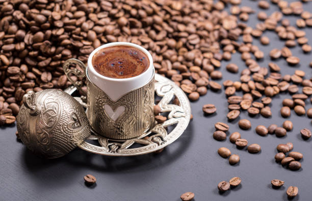 istock traditional turkish coffee and ottoman ornament coffee cup 1002550722