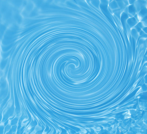 istock blue ripple abstract or water swirl texture background 1002557432