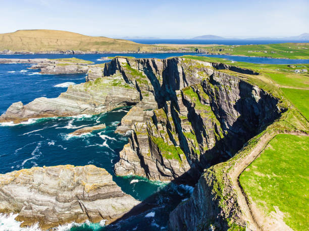 istock Amazing wave lashed Kerry Cliffs, widely accepted as the most spectacular cliffs in County Kerry, Ireland 1002561018