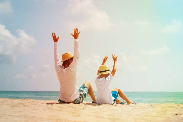 istock father and son enjoy beach vacation 1002564084