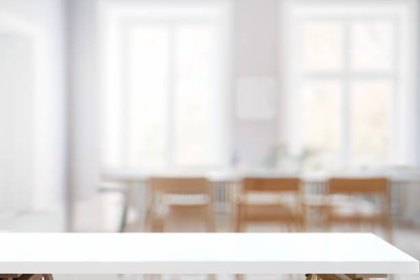 istock Empty top white top table in living room. For product display montage 1002566800